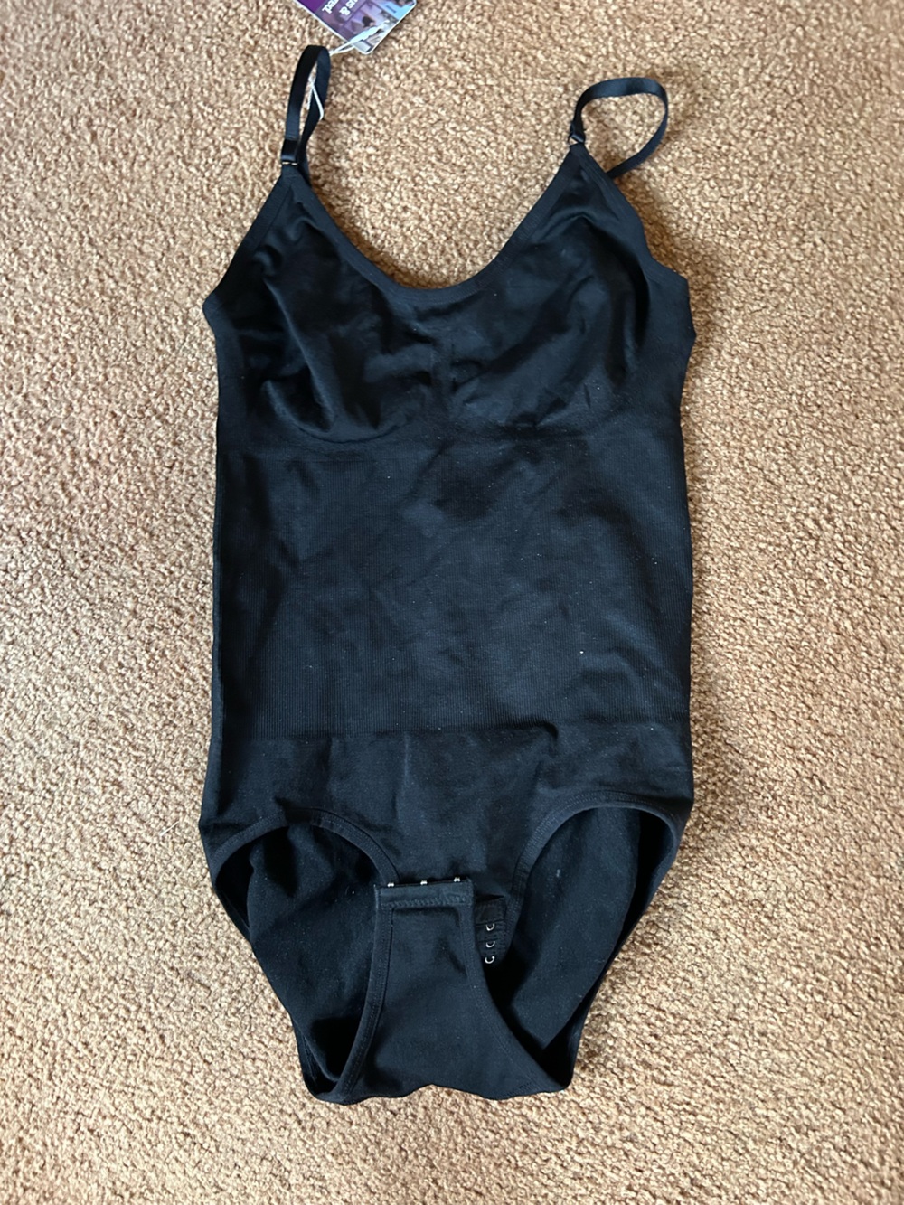 Womans Black One-Piece Bodysuit with Adjustable Straps